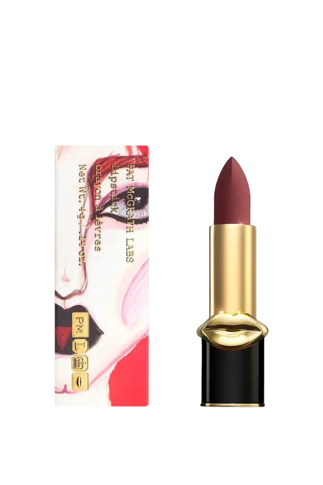 Lipstick with gold cap and black casing next to its packaging on a white background. Monza Outlet