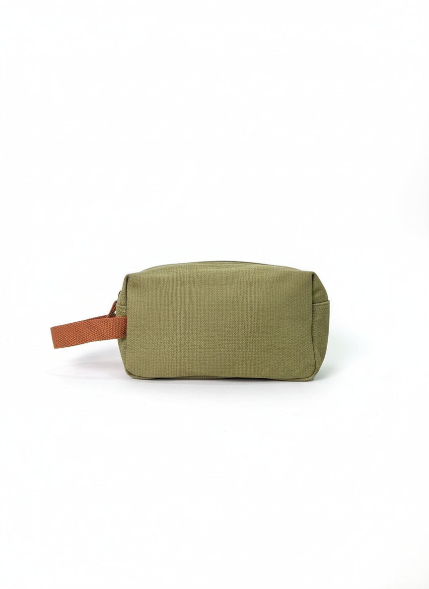Green toiletry bag with brown strap on a white background. Monza Italy, Monza Outlet, Monza Fashion, Shein Outlet