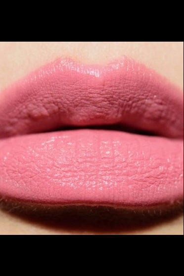 Close-up of pink lips with gloss Monza Outlet