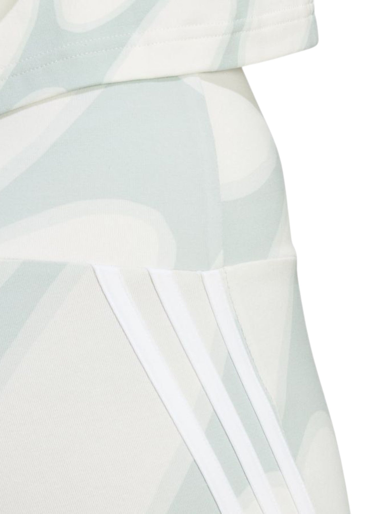 Close-up of a white dress with geometric patterns on a white background. Adidas, Monza Outlet, Monza Fashion, Shein Outlet