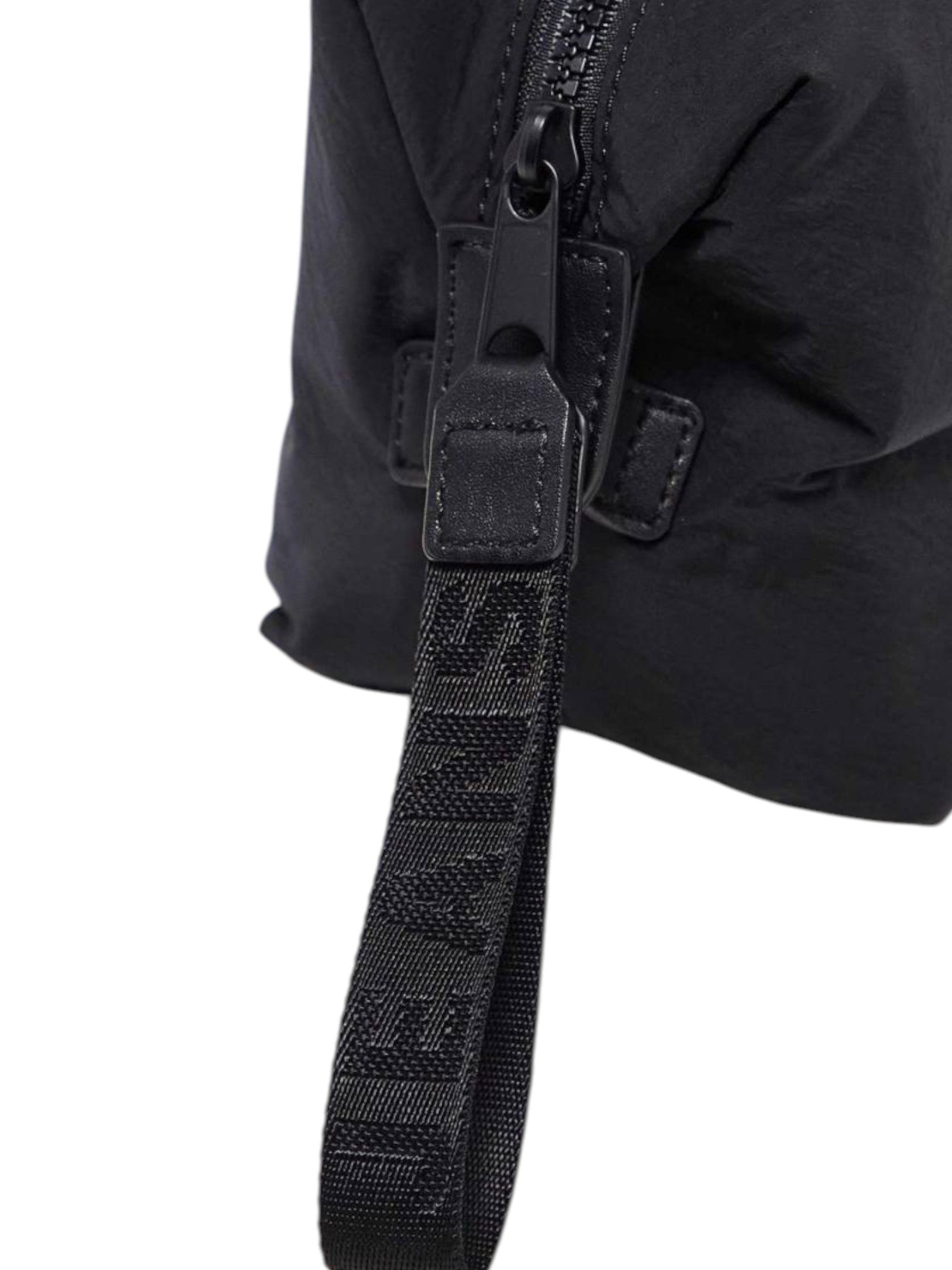 Black strap with branding on a black background. Tommy Hilfiger, Monza Outlet, Monza Fashion, Shein Outlet
