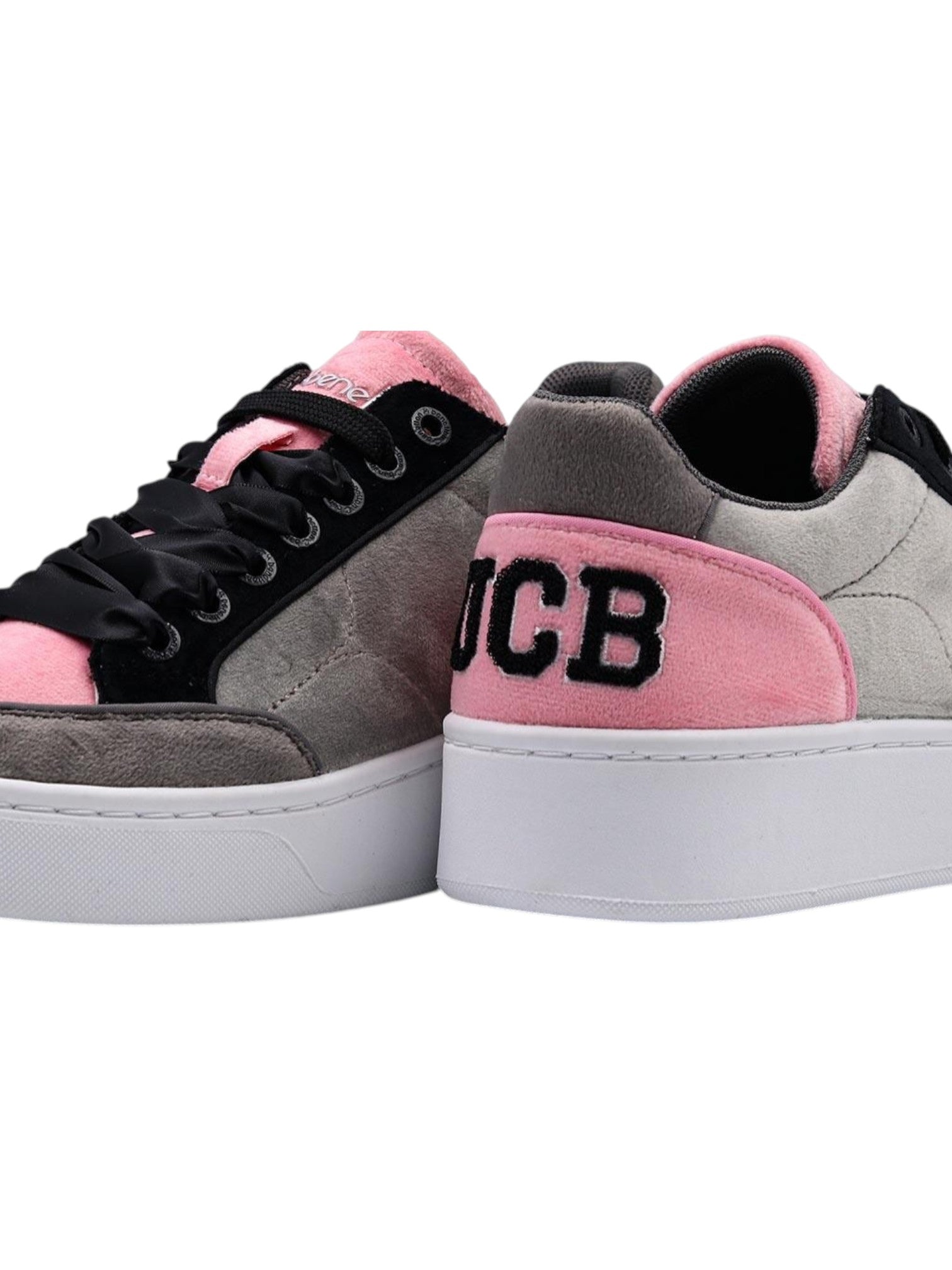 Gray and pink sneakers with 'UCB' branding on a white background.  United Colors of Benetton, Monza Outlet, Monza Fashion, Shein Outlet 