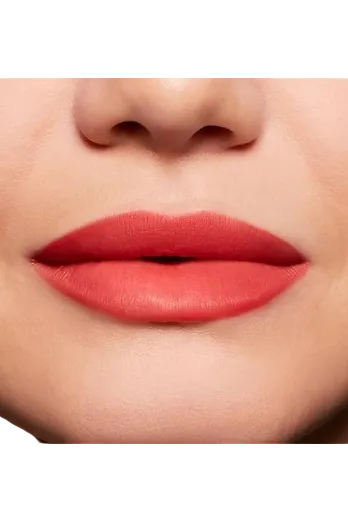 Close-up of a woman's lips with a coral lipstick Monza fashion outlet, monza outlet, shein outlet, shien outlet cosmetics, makeup, perfume