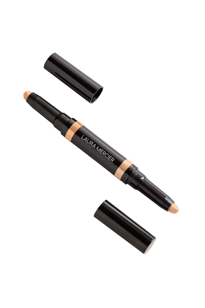 Laura Mercier makeup stick with black casing on a white background  Laura Mercier Monza Outlet