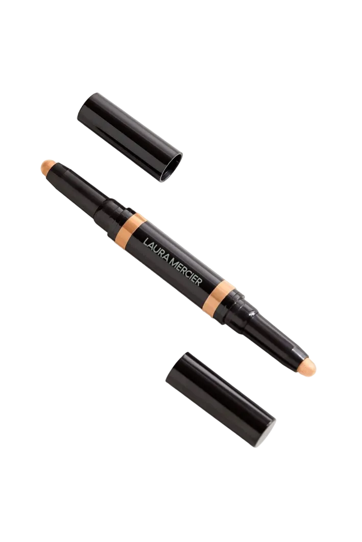 Laura Mercier makeup stick with black casing on a white background  Laura Mercier Monza Outlet