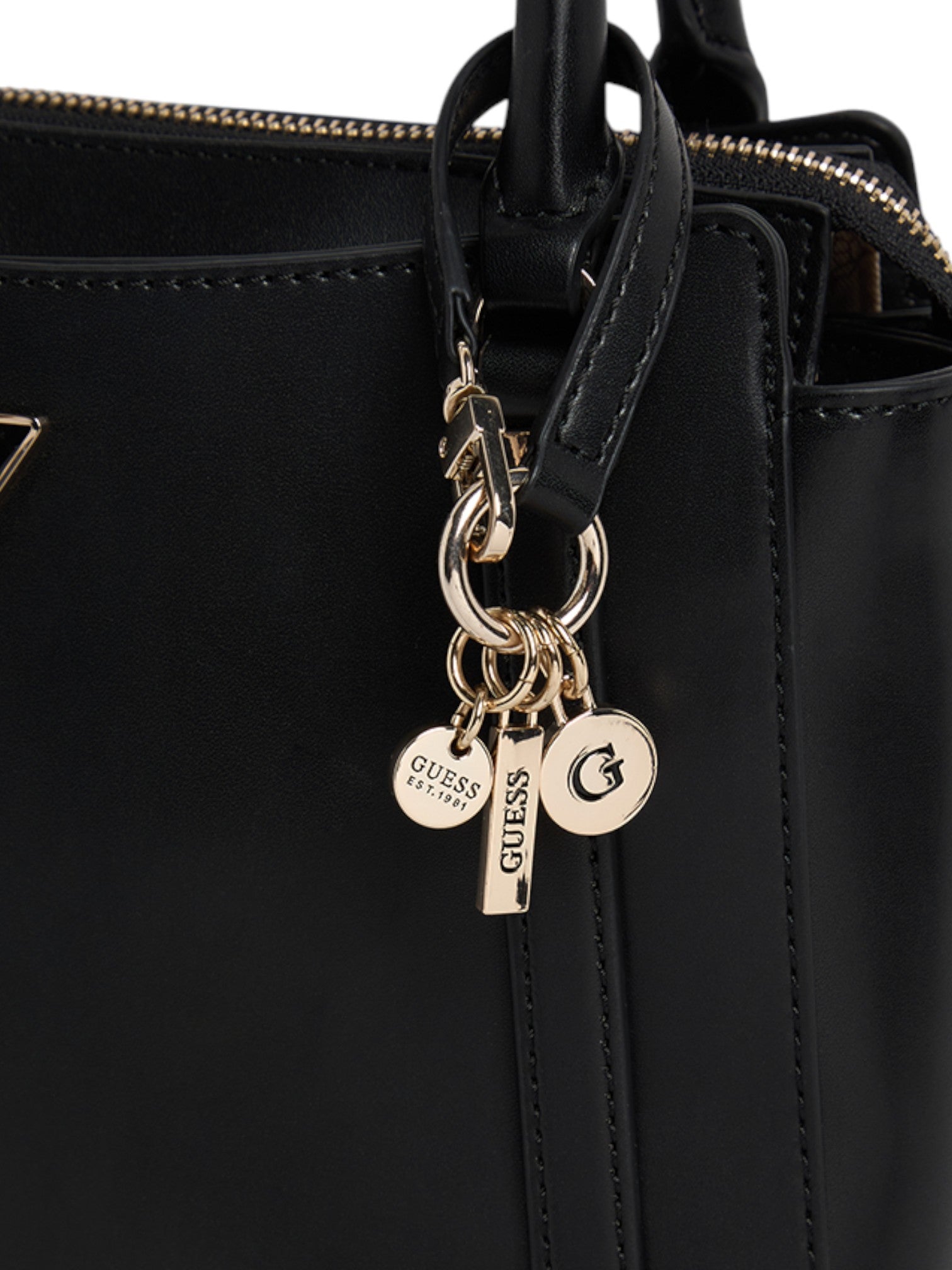 Black handbag with gold charm featuring the Guess logo on a white background. Guess, Monza Outlet, Monza Fashion, Shein Outlet