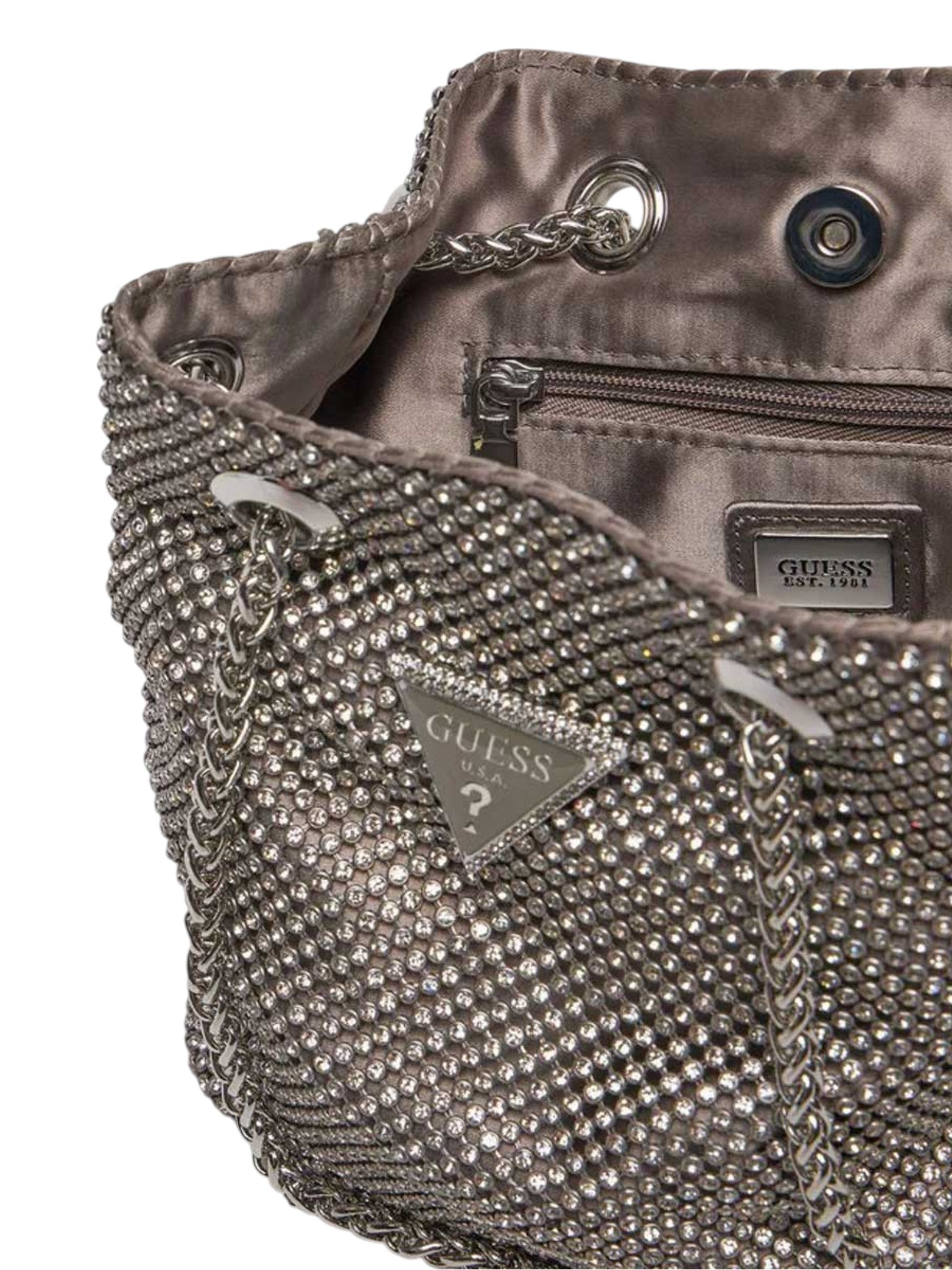 Close-up of a Guess handbag with rhinestone detailing and visible brand logo. Guess, Monza Outlet, Monza Fashion, Shein Outlet
