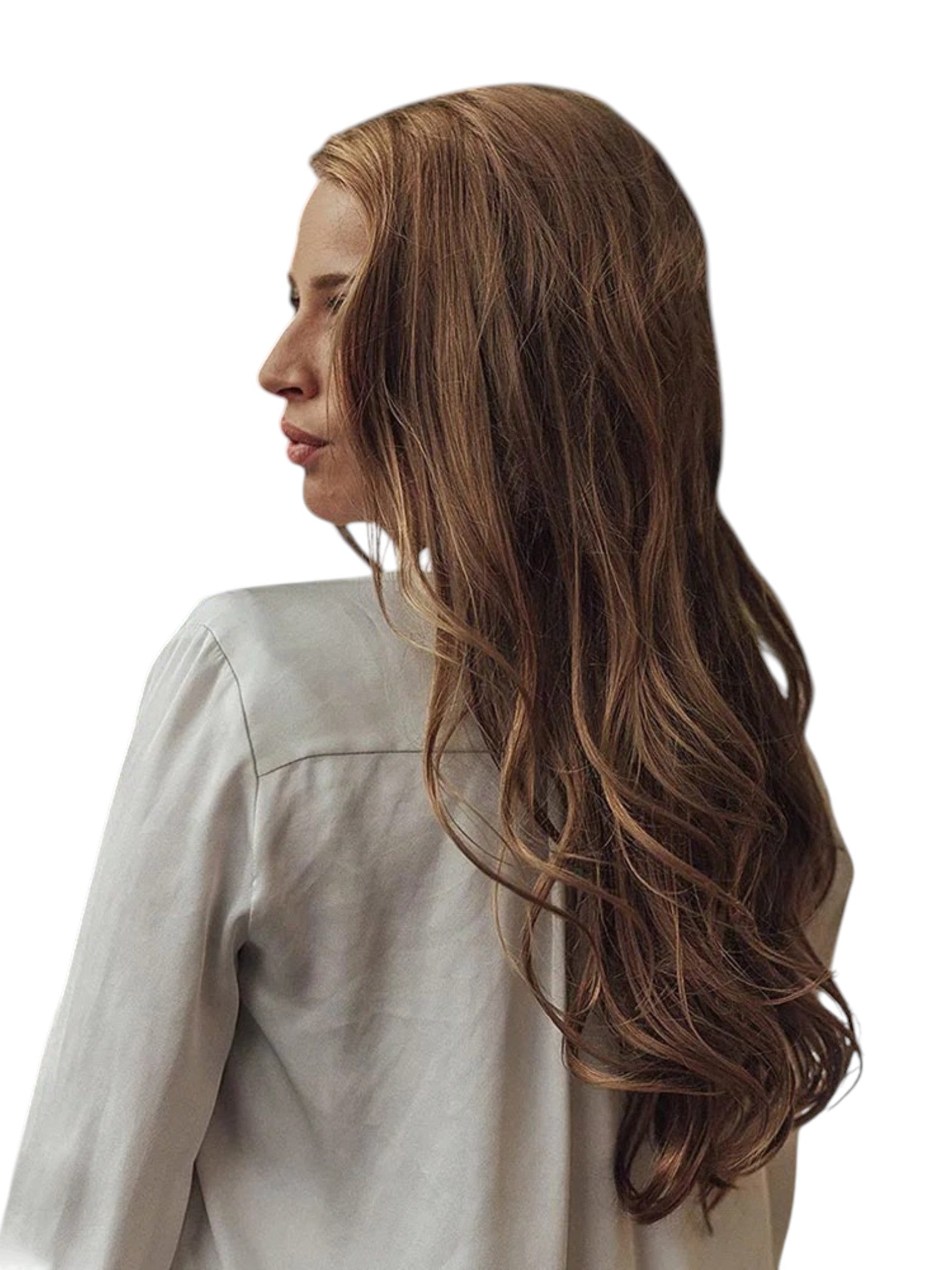 A woman with long, wavy light brown hair is shown in profile against a solid white background, wearing a light gray top. Revlon, Monza Outlet, Monza Fashion, Shein Outlet