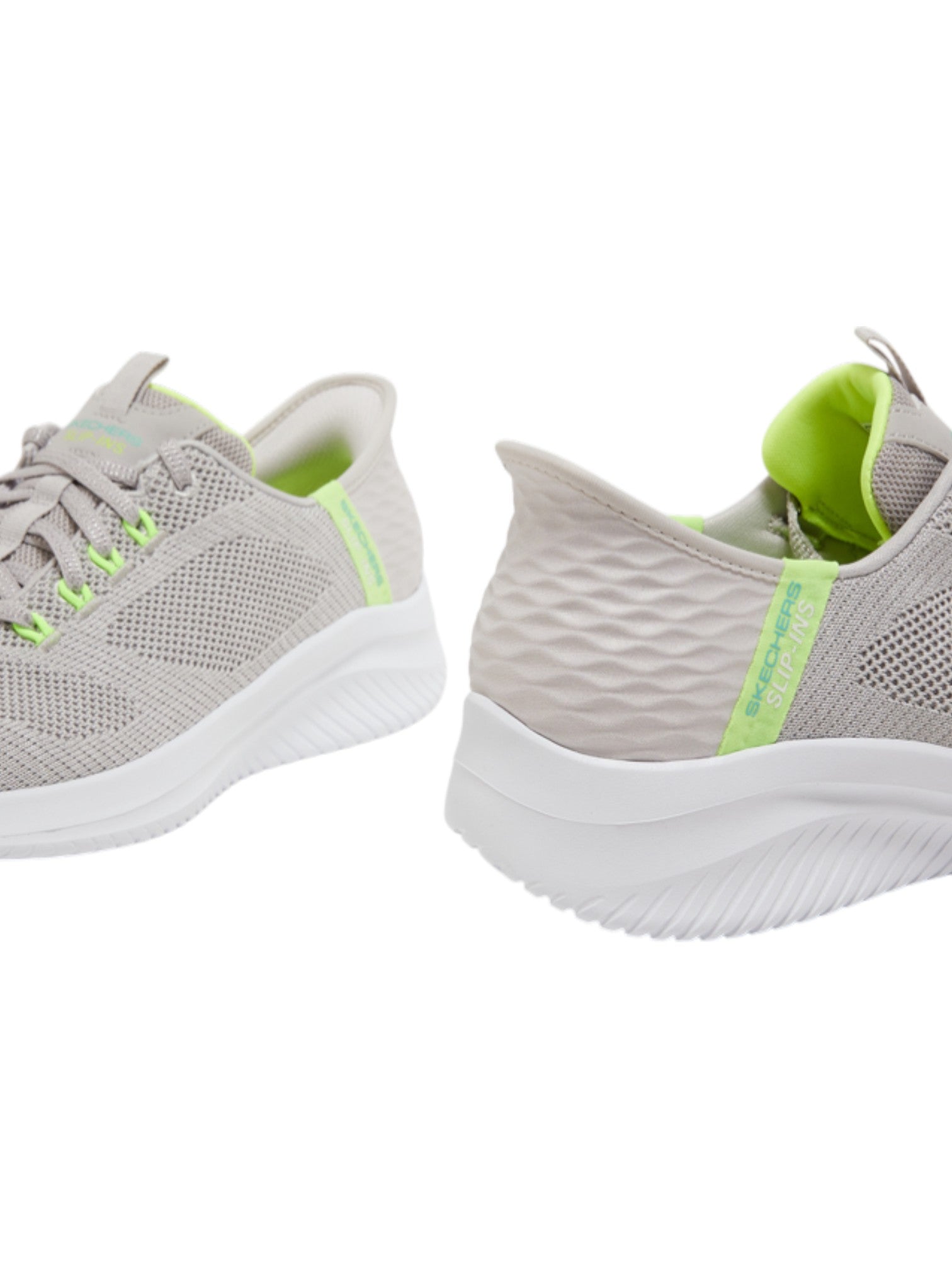 Gray running shoes with green accents on a white background. Skechers, Monza Outlet, Monza Fashion, Shein Outlet