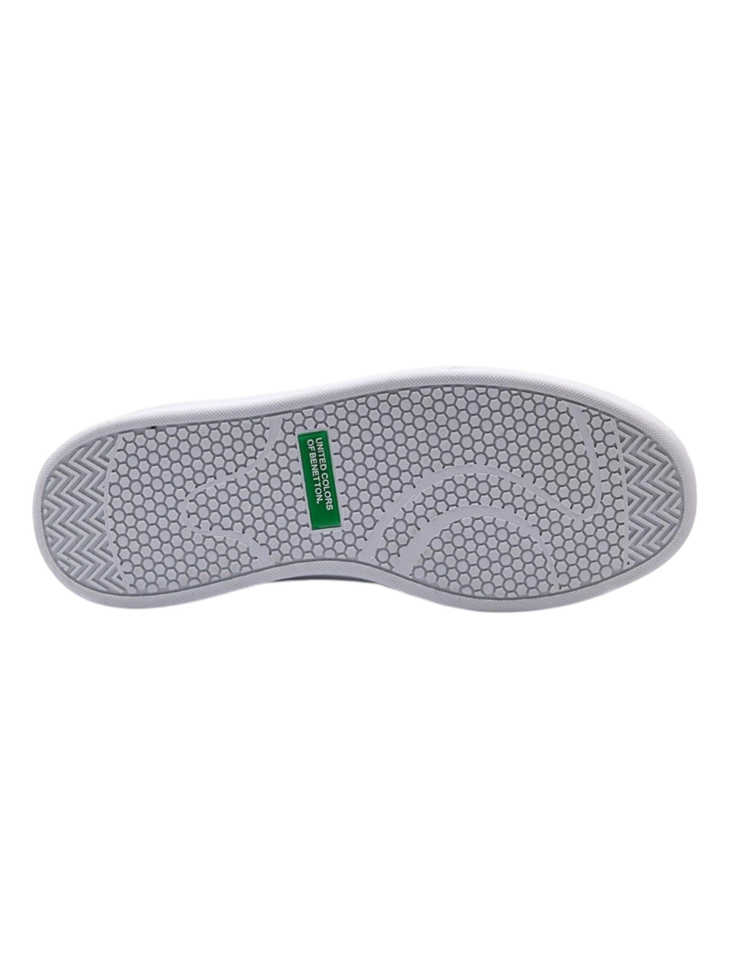 Gray shoe sole with a green logo on a white background.  United Colors of Benetton, Monza Outlet, Monza Fashion, Shein Outlet 