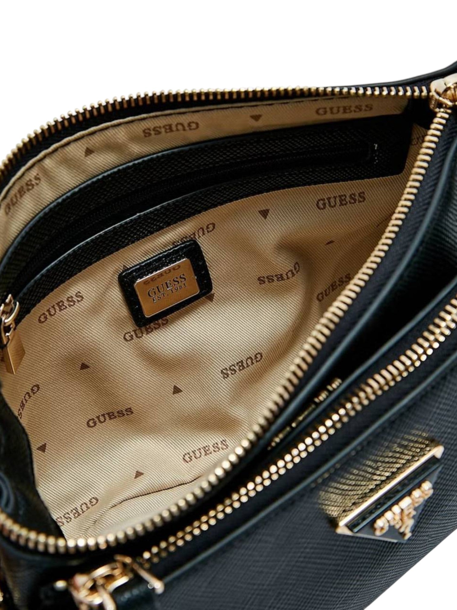Close-up of a blue handbag with gold accents and visible Guess branding. Guess, Monza Outlet, Monza Fashion, Shein Outlet