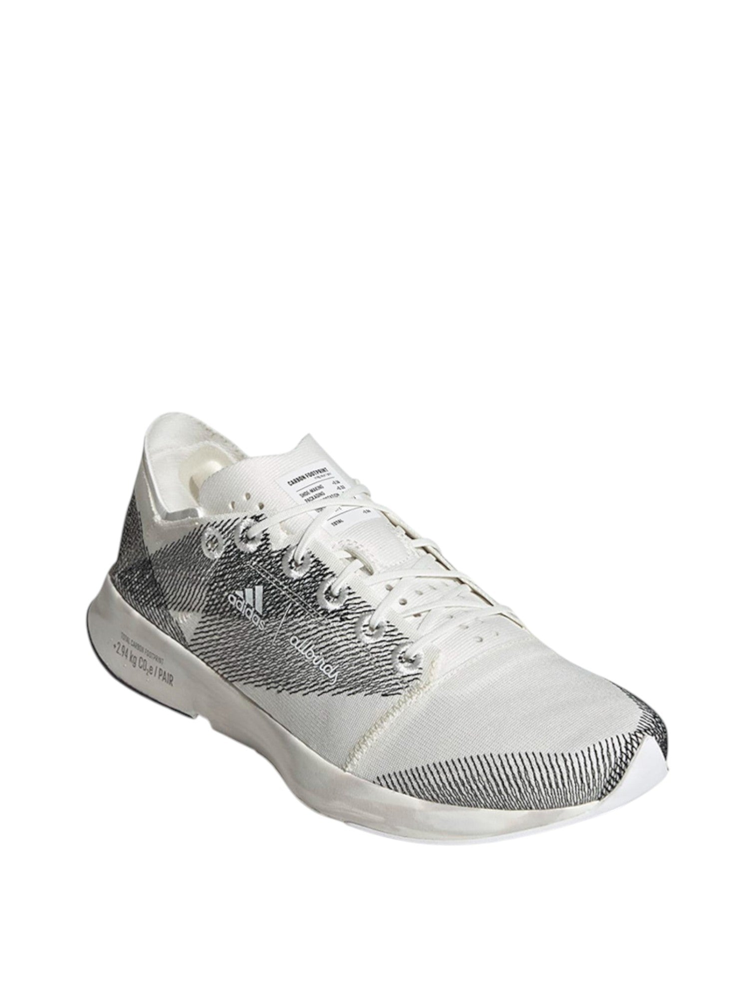 White athletic shoe with black pattern on a white background. Adidas, Monza Outlet, Monza Fashion, Shein Outlet