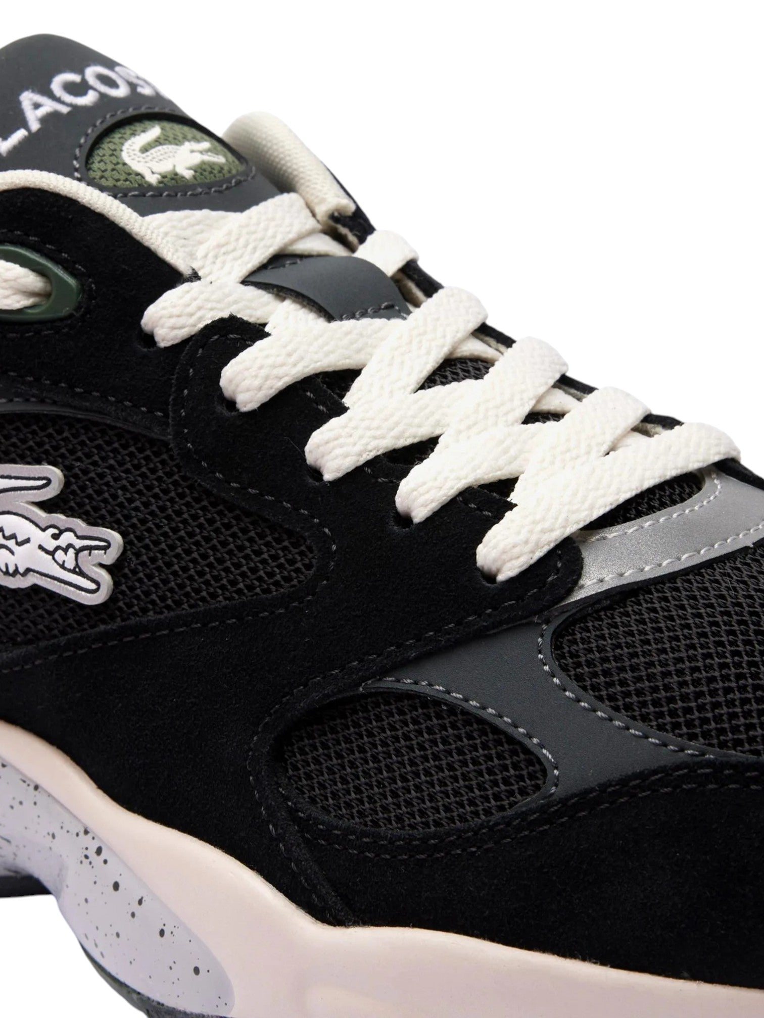 Black sneaker with white laces and Lacoste logo on a white background. Lacoste, Monza Outlet, Monza Fashion, Shein Outlet