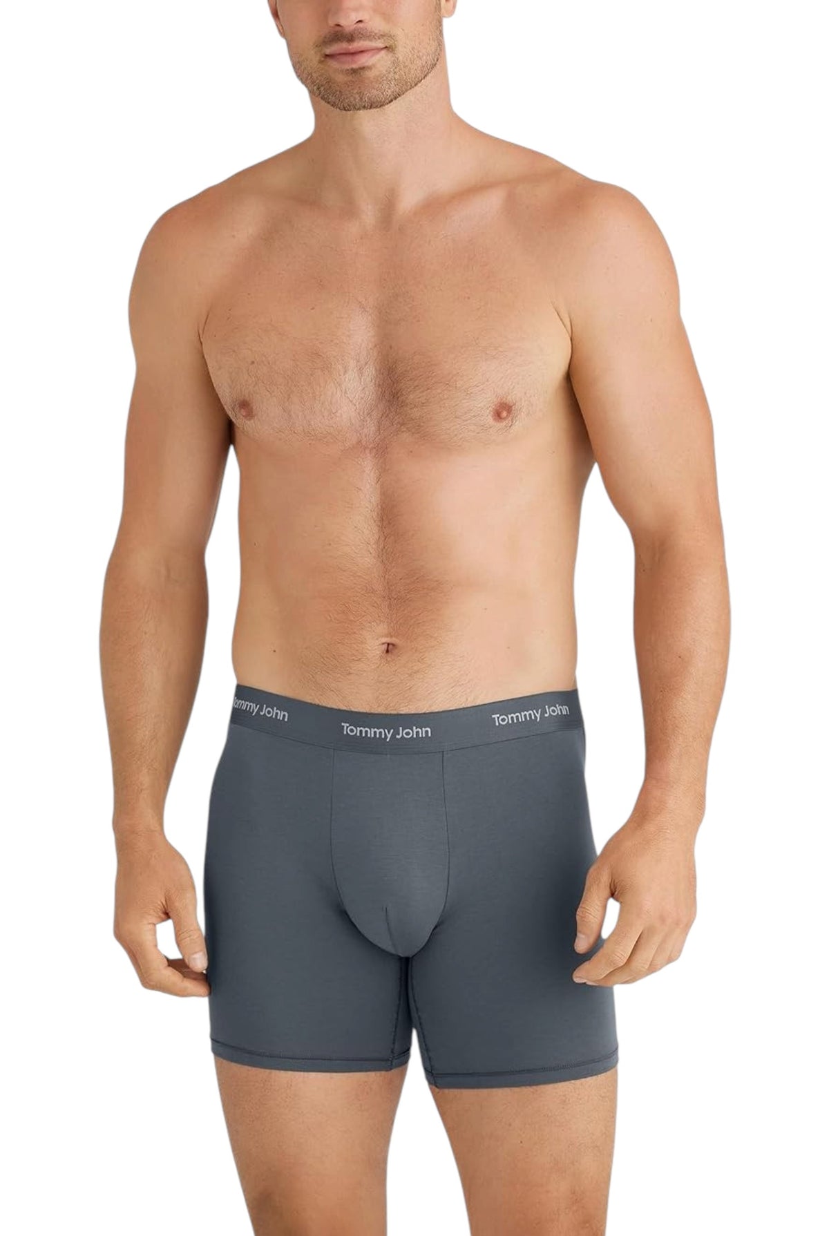 A male model wearing Tommy John boxer briefs, standing in a natural pose against a clean white background, with the underwear clearly visible. Tommy Hilfiger, Monza Outlet, Monza Fashion, Shein Outlet