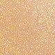 A close up of a glittery gold surface with fine shimmering texture. Sheglam, Monza Outlet, Monza Fashion, Shein Outlet